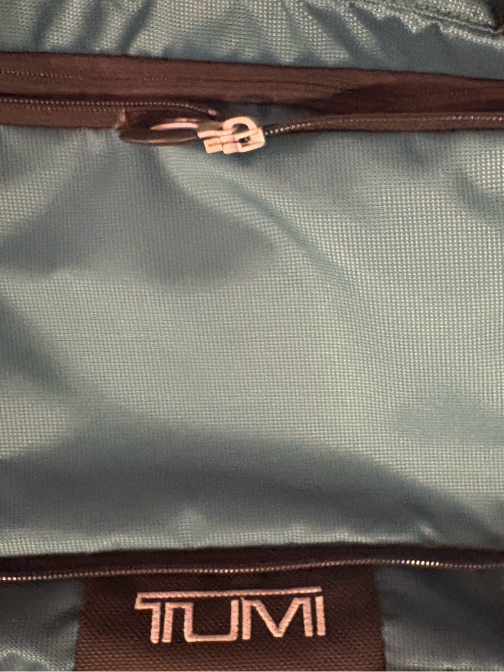 Tumi Teal Travel Duffel / backpack 
Very roomy to store things in very sturdy - Picture 3 of 13